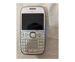 Nokia Asha 302 i punjac